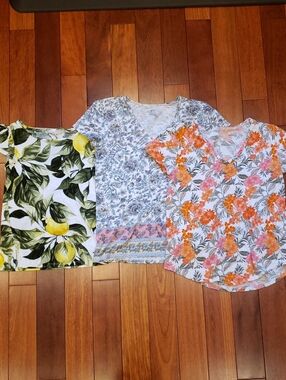 Three XS Women's Short Sleeve Tshirts. Floral